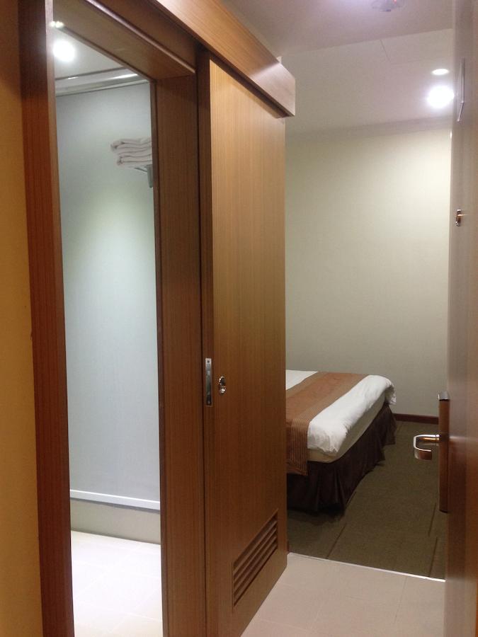 New Cape Inn Singapur Oda fotoğraf